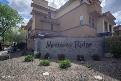 This highly upgraded North Scottsdale gated condominium offers