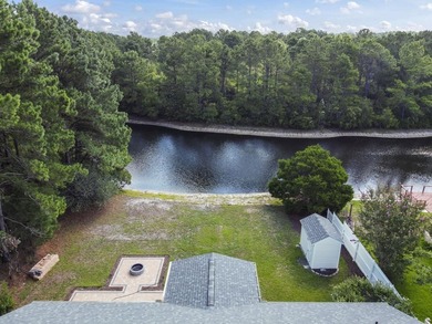 Price Improvement! Beautifully updated 3BR/2BA pond-front home - photo 34