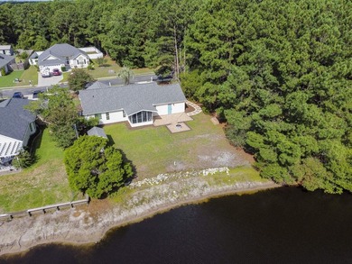 Price Improvement! Beautifully updated 3BR/2BA pond-front home - photo 40