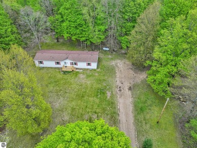 (private lake, pond, creek) Home Active Under Contract in Mesick Michigan