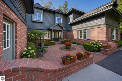 Set on the coveted south end of Big Glen Lake with 90 feet of - photo 3