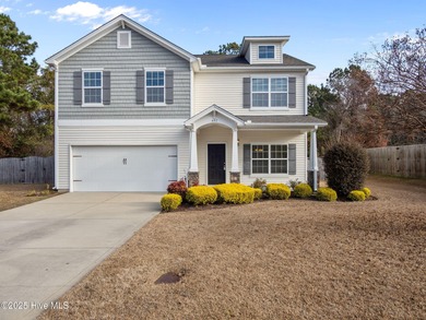 Welcome home to this beautiful two-story retreat nestled in the - photo 1