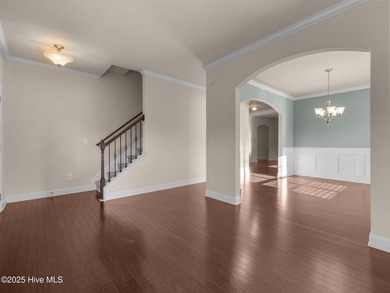 Welcome home to this beautiful two-story retreat nestled in the - photo 3