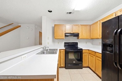 Step into this move in ready, end unit townhome in the heart of - photo 9