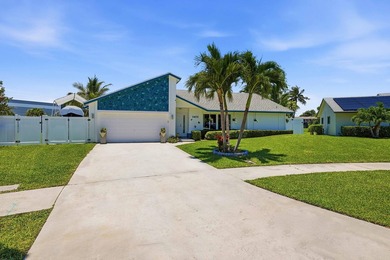 This well-maintained 3-bed, 2-bath CBS pool home sits on one of - photo 1