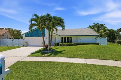 This well-maintained 3-bed, 2-bath CBS pool home sits on one of - photo 2