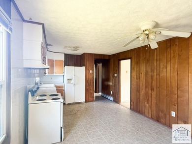 This 3-bedroom, 1-bath home is full of potential and waiting for