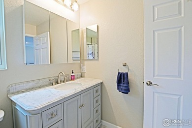 CHECK OUT THIS PRICE IMPROVEMENT ON updated townhome. This end