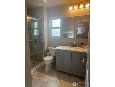 CHECK OUT THIS PRICE IMPROVEMENT ON updated townhome. This end