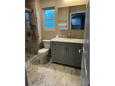 CHECK OUT THIS PRICE IMPROVEMENT ON updated townhome. This end