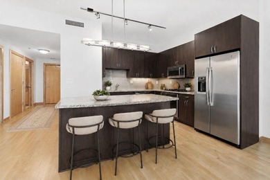 Modern Mill District Condo with a spacious floorplan flooded - photo 2