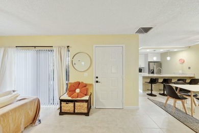 Located in the Village of Sandalwood Lakes South , this newly - photo 3