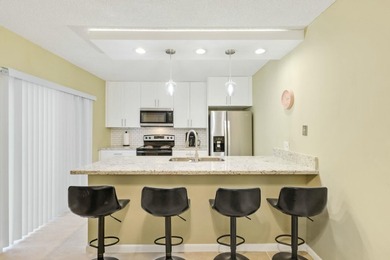 Located in the Village of Sandalwood Lakes South , this newly - photo 7