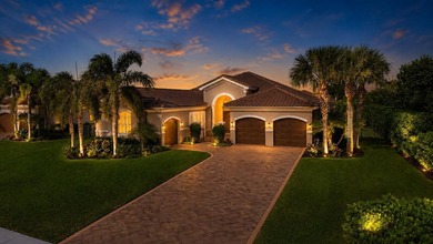 Enjoy refined lakefront living in the prestigious Bay Hill at - photo 1