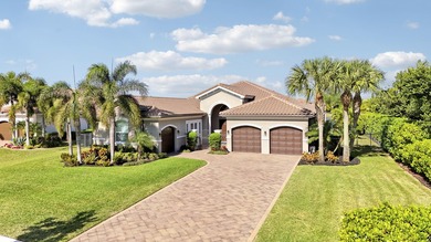 Enjoy refined lakefront living in the prestigious Bay Hill at - photo 2