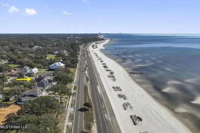 Stunning beachfront bungalow located on a prime corner lot with - photo 2
