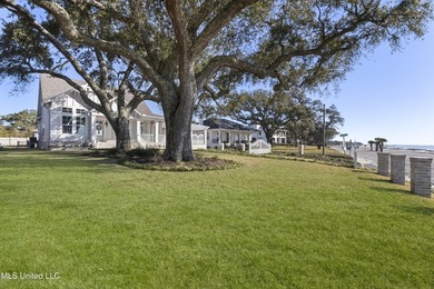 Stunning beachfront bungalow located on a prime corner lot with - photo 3