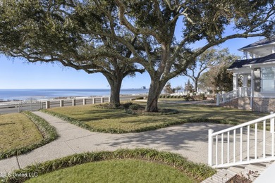 Stunning beachfront bungalow located on a prime corner lot with - photo 6