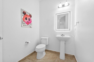 Experience effortless East Boca living in this meticulously - photo 13