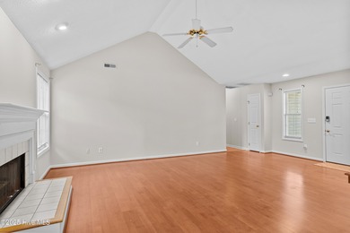 Welcome to 1205 Woodburn Ct, a well-maintained 3 bedroom, 2 bath