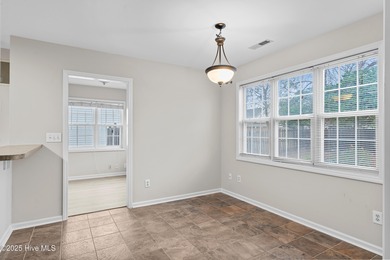 Welcome to 1205 Woodburn Ct, a well-maintained 3 bedroom, 2 bath