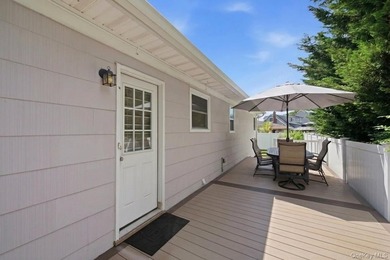 Refined comfort meets effortless Long Island living in this - photo 15