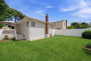 Refined comfort meets effortless Long Island living in this - photo 17