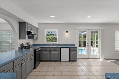 Nestled on a quiet cul-de-sac, this original-owner, custom-built - photo 13