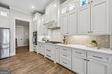 SIMPLY STUNNING!!!! Marsh view sunsets. A Chefs dream kitchen - photo 16