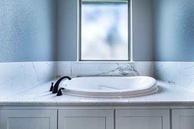 Welcome to this NEW CONSTRUCTION HOME located in a gated lake - photo 22