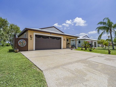 Located in the desirable Spanish Lakes community, this - photo 3