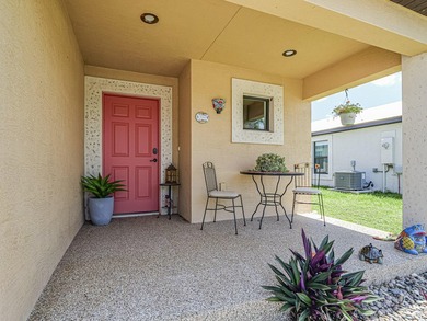 Located in the desirable Spanish Lakes community, this - photo 4