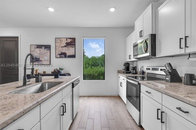 Welcome to this beautifully upgraded 2022 fee simple townhome in - photo 10