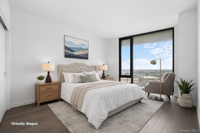Welcome to Grand One at Sky View Parc. This mint one-bedroom