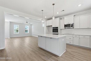 Our two-story Edisto plan features a spacious great room which - photo 12
