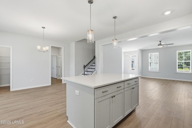Our two-story Edisto plan features a spacious great room which - photo 13