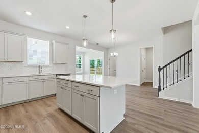 Our two-story Edisto plan features a spacious great room which - photo 14