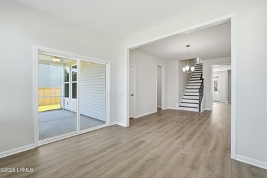 Our two-story Edisto plan features a spacious great room which - photo 16