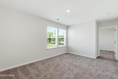 Our two-story Edisto plan features a spacious great room which - photo 26
