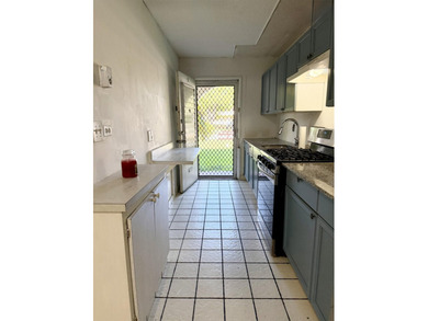 ComWelcome home to this beautifully maintained first-floor - photo 1