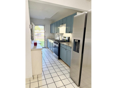 ComWelcome home to this beautifully maintained first-floor - photo 5