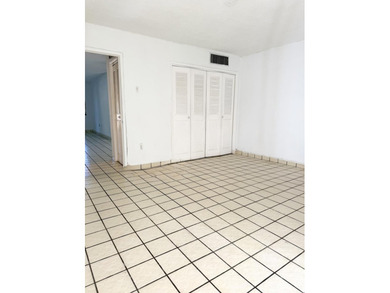 ComWelcome home to this beautifully maintained first-floor - photo 9