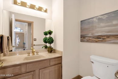 Set on a quiet street with sweeping views of Four Peaks and Red