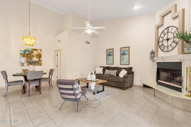 Set on a quiet street with sweeping views of Four Peaks and Red