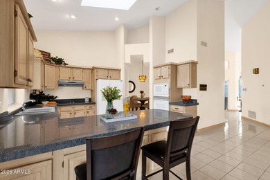 Set on a quiet street with sweeping views of Four Peaks and Red