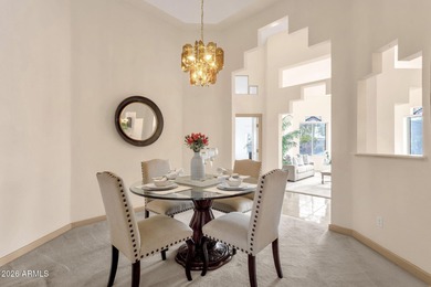 Set on a quiet street with sweeping views of Four Peaks and Red