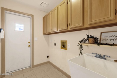 Set on a quiet street with sweeping views of Four Peaks and Red