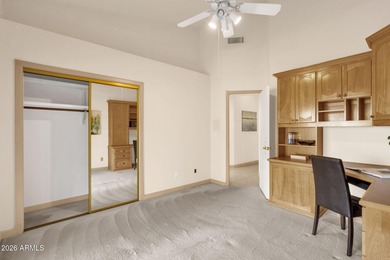 Set on a quiet street with sweeping views of Four Peaks and Red