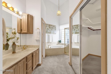 Set on a quiet street with sweeping views of Four Peaks and Red