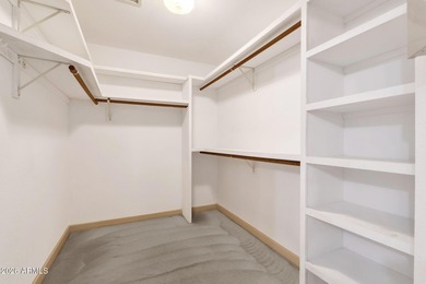 Set on a quiet street with sweeping views of Four Peaks and Red